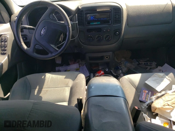 2004 Ford Escape XLS with VIN 1FMYU021X4DA07352, listed as a Copart auction lot 68909864 with 275,776 mi miles and Salvage Title. Bid and sale history available at DreamBid. Image 8.