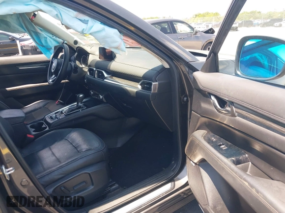 2018 Mazda CX-5 Grand Touring with VIN JM3KFADM8J1310328, listed as a IAAI auction lot 42322780 with 106,378 mi miles and . Bid and sale history available at DreamBid. Image 5.
