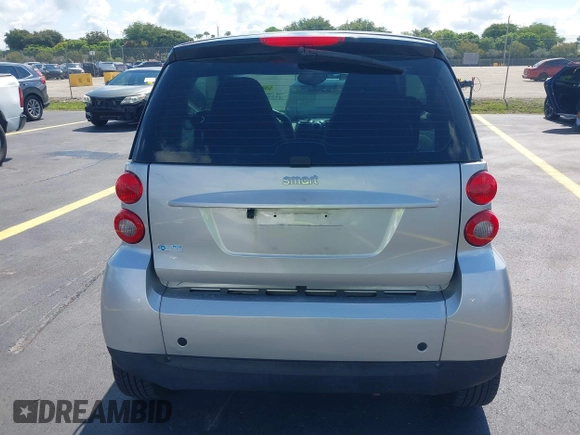 2009 Smart fortwo Pure z VIN WMEEJ31X49K210166, wystawiony jako IAAI lot #42251960 z przebiegiem 104 788 mil mil oraz . Historia ofert i sprzedaży dostępna na DreamBid. Obrazek 17.