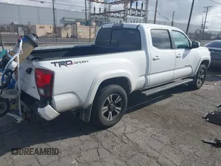 2018 Toyota Tacoma SR5 with VIN 3TMBZ5DN7JM016650, listed as a IAAI auction lot 41903835 with 105,123 mi miles and . Bid and sale history available at DreamBid. Image 4.