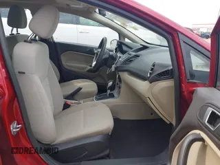 2016 Ford Fiesta SE with VIN 3FADP4BJ4GM118382, listed as a IAAI auction lot 41999324 with 91,440 mi miles. Bid and sale history available at carsss.com. Image 5.