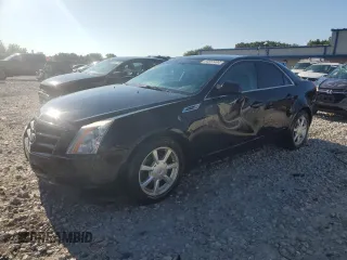 2009 Cadillac CTS AWD z VIN 1G6DG577890147485, wystawiony jako Copart lot #64857494 z przebiegiem 280 047 mil mil oraz Czysty tytuł • Clean title. Historia ofert i sprzedaży dostępna na DreamBid. Obrazek 1.