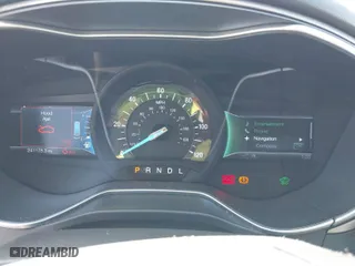 2014 Ford Fusion SE Hybrid with VIN 3FA6P0LU8ER253939, listed as a IAAI auction lot 41882200 with 241,178 mi miles. Bid and sale history available at carsss.com. Image 7.