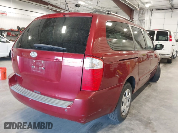 2010 Kia Sedona LX with VIN KNDMG4C35A6343380, listed as a IAAI auction lot 42042669 with 119,648 mi miles. Bid and sale history available at carsss.com. Image 4.