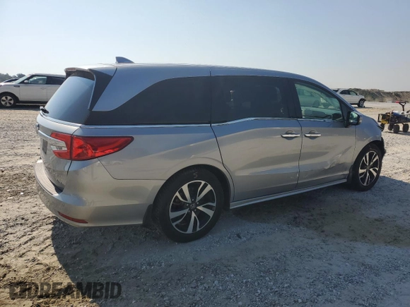 2018 Honda Odyssey Elite with VIN 5FNRL6H95JB062033, listed as a Copart auction lot 63732915 with 105,234 mi miles and Salvage title. Bid and sale history available at DreamBid. Image 3.