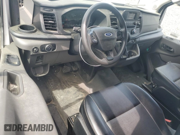 2021 Ford Transit Cargo с VIN 1FTBR1C81MKA80750, выставлен на аукционе Copart как лот 55567135 с пробегом 43 990 миль миль и Чистый • Clean title. История ставок и продаж доступна на DreamBid. Изображение 8.