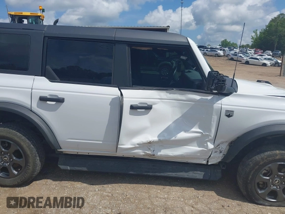 2021 Ford Bronco with VIN 1FMDE5BH6MLA80102, listed as a IAAI auction lot 42126680 with 67,913 mi miles and . Bid and sale history available at DreamBid. Image 6.