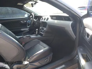 2015 Ford Mustang EcoBoost with VIN 1FA6P8TH5F5358816, listed as a IAAI auction lot 41573005 with 57,975 mi miles and . Bid and sale history available at carsss.com. Image 5.