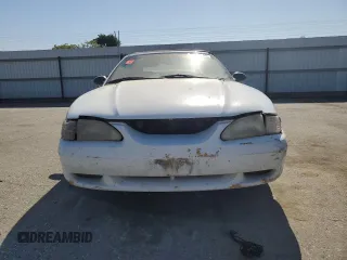 1998 Ford Mustang with VIN 1FAFP4448WF269580, listed as a Copart auction lot 54861155 with 304,869 mi miles and Salvage title. Bid and sale history available at DreamBid. Image 5.