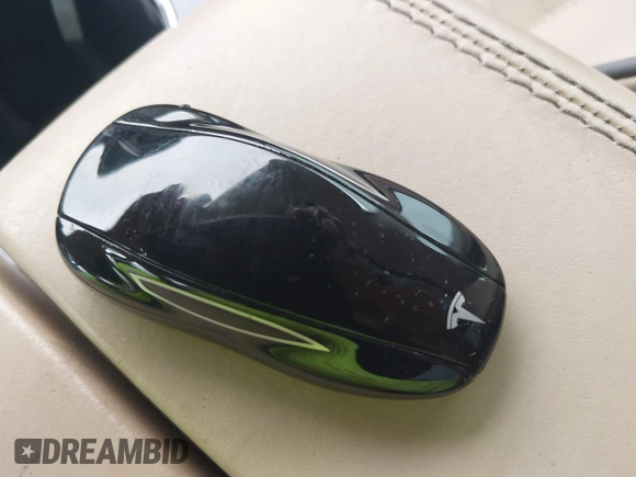 2013 Tesla Model S Performance with VIN 5YJSA1DP9DFP04076, listed as a IAAI auction lot 42185465 with 179,640 mi miles and . Bid and sale history available at DreamBid. Image 11.