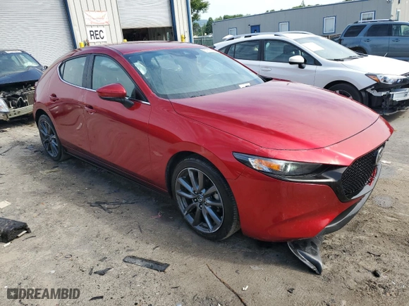 2019 Mazda Mazda3 Hatchback with VIN JM1BPBJM9K1140773, listed as a Copart auction lot 57002824 with 76,804 mi miles and Salvage Title. Bid and sale history available at carsss.com. Image 4.
