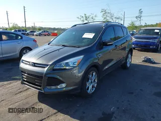 2016 Ford Escape Titanium with VIN 1FMCU9J94GUA63359, listed as a IAAI auction lot 41954514 with 94,315 mi miles. Bid and sale history available at carsss.com. Image 17.