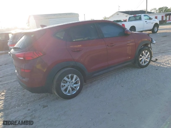 2020 Hyundai Tucson SE with VIN KM8J23A49LU243641, listed as a IAAI auction lot 41794008 with 79,613 mi miles. Bid and sale history available at carsss.com. Image 4.