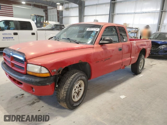 1999 Dodge Dakota SLT with VIN 1B7GG22X1XS295947, listed as a Copart auction lot 82611714 with Not Provided miles and Salvage Title. Bid and sale history available at carsss.com. Image 1.