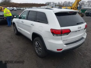 2021 Jeep Grand Cherokee 80th Anniversary with VIN 1C4RJFBG1MC537952, listed as a IAAI auction lot 41951647 with 39,744 mi miles and . Bid and sale history available at DreamBid. Image 3.