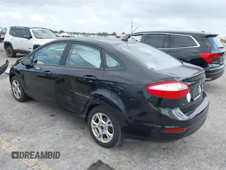 2015 Ford Fiesta SE with VIN 3FADP4BJ5FM130099, listed as a IAAI auction lot 42126960 with 82,299 mi miles and . Bid and sale history available at DreamBid. Image 3.