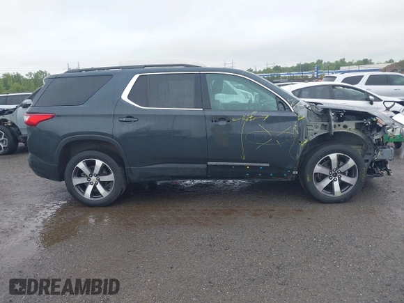 2021 Chevrolet Traverse LT z VIN 1GNEVHKW2MJ195002, wystawiony jako IAAI lot #42314214 z przebiegiem 50 877 mil mil oraz . Historia ofert i sprzedaży dostępna na DreamBid. Obrazek 13.