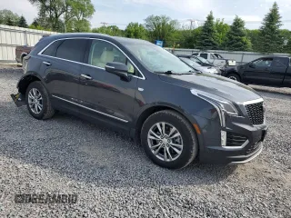 2022 Cadillac XT5 AWD Premium Luxury with VIN 1GYKNDRS9NZ126988, listed as a Copart auction lot 61019965 with 30,189 mi miles and Salvage title. Bid and sale history available at DreamBid. Image 4.