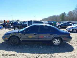 1998 Ford Taurus LX with VIN 1FAFP52U0WA226924, listed as a IAAI auction lot 41702083 with 55,998 mi miles. Bid and sale history available at carsss.com. Image 14.