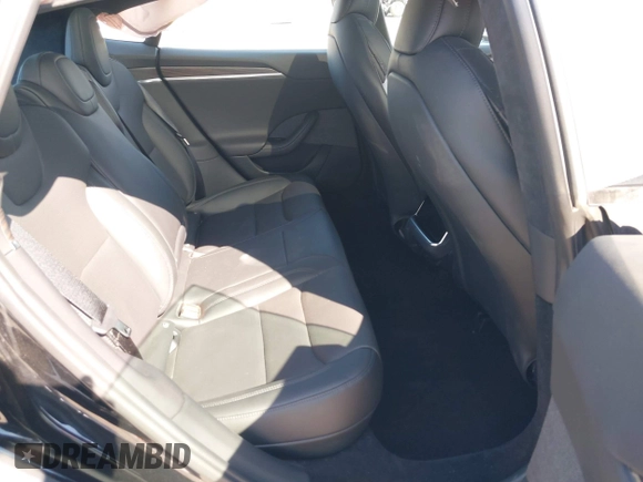 2023 Tesla Model S with VIN 5YJSA1E54PF531021, listed as a IAAI auction lot 42014104 with Not provided miles and . Bid and sale history available at DreamBid. Image 8.