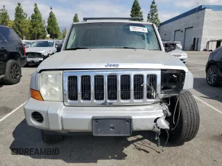 2007 Jeep Commander Sport z VIN 1J8HG48K97C505712, wystawiony jako Copart lot #72011114 z przebiegiem 146 981 mil mil oraz Szkoda całkowita • Salvage title. Historia ofert i sprzedaży dostępna na DreamBid. Obrazek 5.