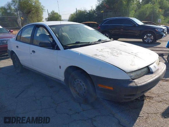 1998 Saturn SL z VIN 1G8ZG5283WZ233209, wystawiony jako IAAI lot #40997373 z przebiegiem 240 385 mil mil oraz . Historia ofert i sprzedaży dostępna na DreamBid. Obrazek 1.