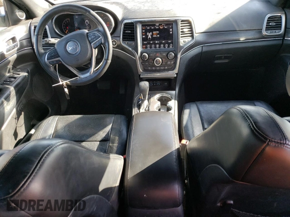2018 Jeep Grand Cherokee Sterling Edition with VIN 1C4RJFBG4JC128226, listed as a Copart auction lot 52759825 with 134,882 mi miles and Salvage Title. Bid and sale history available at carsss.com. Image 8.