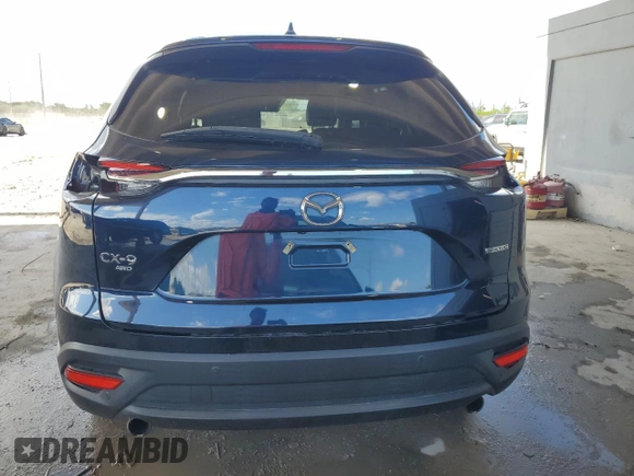 2022 Mazda CX-9 Touring Plus with VIN JM3TCBAYXN0607056, listed as a Copart auction lot 61740065 with 59,281 mi miles and Salvage title. Bid and sale history available at DreamBid. Image 6.