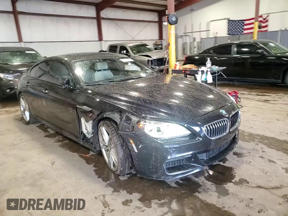 2015 BMW 6 Series 640i xDrive z VIN WBA6B8C58FD453159, wystawiony jako Copart lot #88931285 z przebiegiem 145 656 mil mil oraz Szkoda całkowita • Salvage title. Historia ofert i sprzedaży dostępna na DreamBid. Obrazek 13.