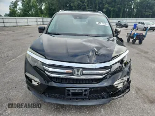 2016 Honda Pilot EX-L с VIN 5FNYF6H60GB097273, выставлен на аукционе Copart как лот 64010115 с пробегом 102 891 миль миль и Списание • Salvage title. История ставок и продаж доступна на DreamBid. Изображение 5.