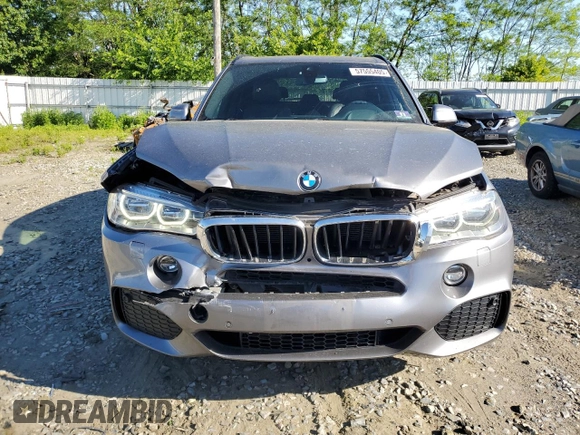 2015 BMW X5 xDrive35i z VIN 5UXKR0C57F0K61171, wystawiony jako Copart lot #57555405 z przebiegiem 119 664 mil mil oraz Szkoda całkowita • Salvage title. Historia ofert i sprzedaży dostępna na DreamBid. Obrazek 5.