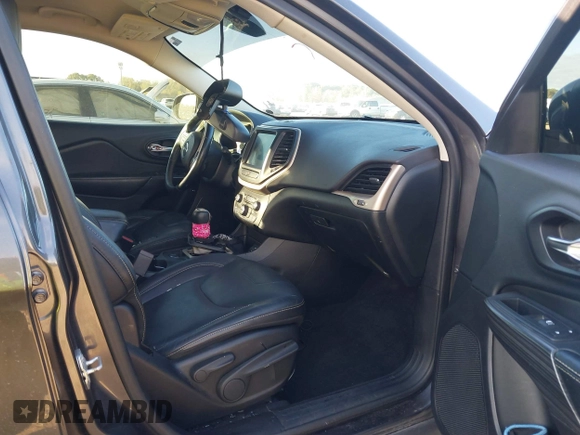 2015 Jeep Cherokee Limited with VIN 1C4PJMDS4FW659798, listed as a IAAI auction lot 40482812 with 65,453 mi miles. Bid and sale history available at carsss.com. Image 5.