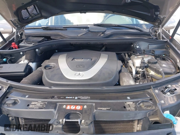 2006 Mercedes-Benz M 350 with VIN 4JGBB86E06A018999, listed as a IAAI auction lot 41923582 with 77,121 mi miles and . Bid and sale history available at DreamBid. Image 10.