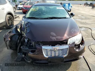 2003 Chrysler 300M M z VIN 2C3HE66G33H553502, wystawiony jako Copart lot #72036814 z przebiegiem 152 915 mil mil oraz Szkoda całkowita • Salvage title. Historia ofert i sprzedaży dostępna na DreamBid. Obrazek 5.