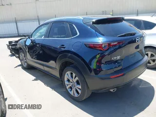 2023 Mazda CX-30 S Select with VIN 3MVDMBBM3PM514030, listed as a IAAI auction lot 42326959 with 41,226 mi miles and . Bid and sale history available at DreamBid. Image 3.