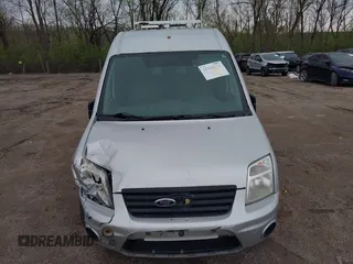 2010 Ford Transit Connect XLT z VIN NM0KS9BN0AT020410, wystawiony jako IAAI lot #41962010 z przebiegiem 253 627 mil mil oraz . Historia ofert i sprzedaży dostępna na DreamBid. Obrazek 6.