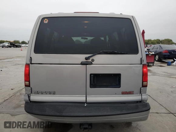 2000 GMC Safari z VIN 1GKDM19W8YB534175, wystawiony jako Copart lot #79751414 z przebiegiem Nie podano mil oraz Szkoda całkowita • Salvage title. Historia ofert i sprzedaży dostępna na DreamBid. Obrazek 6.