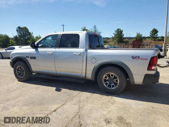 2017 Ram 1500 Rebel z VIN 1C6RR7YT4HS531035, wystawiony jako Copart lot #57652345 z przebiegiem 130 013 mil mil oraz Czysty tytuł • Clean title. Historia ofert i sprzedaży dostępna na DreamBid. Obrazek 2.