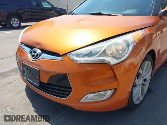 2012 Hyundai Veloster w/Gray Int with VIN KMHTC6ADXCU037879, listed as a IAAI auction lot 42093850 with 189,991 mi miles and . Bid and sale history available at DreamBid. Image 12.