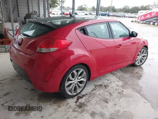 2013 Hyundai Veloster w/Gray Int with VIN KMHTC6AD4DU092345, listed as a IAAI auction lot 41382227 with 134,621 mi miles. Bid and sale history available at carsss.com. Image 4.