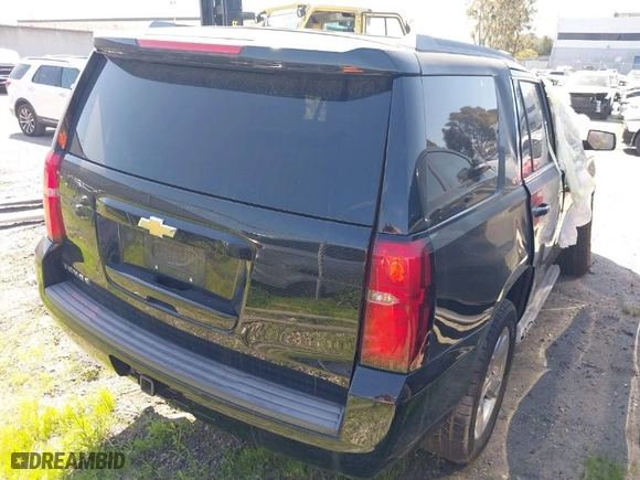 2015 Chevrolet Tahoe LT with VIN 1GNSCBKC6FR615554, listed as a IAAI auction lot 41572180 with 170,755 mi miles. Bid and sale history available at carsss.com. Image 4.