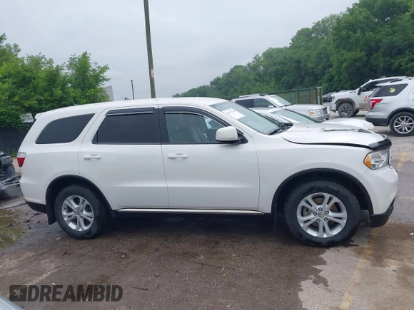 2012 Dodge Durango SXT with VIN 1C4RDJAG8CC336267, listed as a IAAI auction lot 42377138 with 179,555 mi miles and . Bid and sale history available at DreamBid. Image 13.