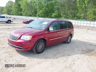 2016 Chrysler Town & Country Touring-L with VIN 2C4RC1CG7GR221690, listed as a IAAI auction lot 42038763 with 188,184 mi miles. Bid and sale history available at carsss.com. Image 2.