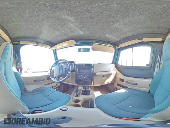 2000 Jeep Wrangler Sahara z VIN 1J4FA59S1YP746043, wystawiony jako Copart lot #58842665 z przebiegiem 148 348 mil mil oraz Szkoda całkowita • Salvage title. Historia ofert i sprzedaży dostępna na DreamBid. Obrazek 14.