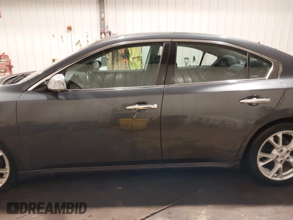 2013 Nissan Maxima SV with VIN 1N4AA5AP5DC801446, listed as a IAAI auction lot 41996092 with 124,823 mi miles and . Bid and sale history available at DreamBid. Image 15.