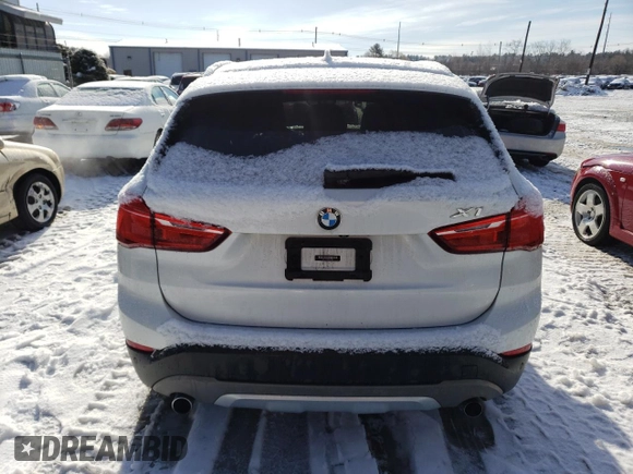 2017 BMW X1 xDrive28i with VIN WBXHT3C33H5F77000, listed as a Copart auction lot 41860993 with 113,553 mi miles. Bid and sale history available at carsss.com. Image 6.