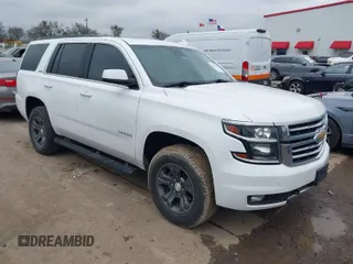 2017 Chevrolet Tahoe LT with VIN 1GNSKBKC1HR401044, listed as a IAAI auction lot 41573362 with 103,865 mi miles and . Bid and sale history available at DreamBid. Image 1.