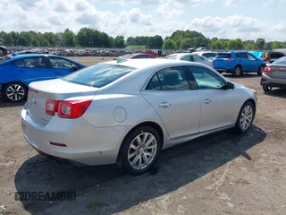 2016 Chevrolet Malibu Limited LTZ with VIN 1G11E5SAXGU142716, listed as a IAAI auction lot 40064815 with 260,881 mi miles. Bid and sale history available at carsss.com. Image 4.