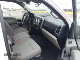 2020 Ford F-150 XL with VIN 1FTEX1C40LKE45241, listed as a IAAI auction lot 41403576 with 58,476 mi miles and . Bid and sale history available at DreamBid. Image 5.