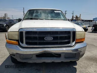 1999 Ford F-250 XL with VIN 1FTNX20L8XEB01923, listed as a Copart auction lot 65404495 with 383,297 mi miles and Salvage title. Bid and sale history available at DreamBid. Image 5.